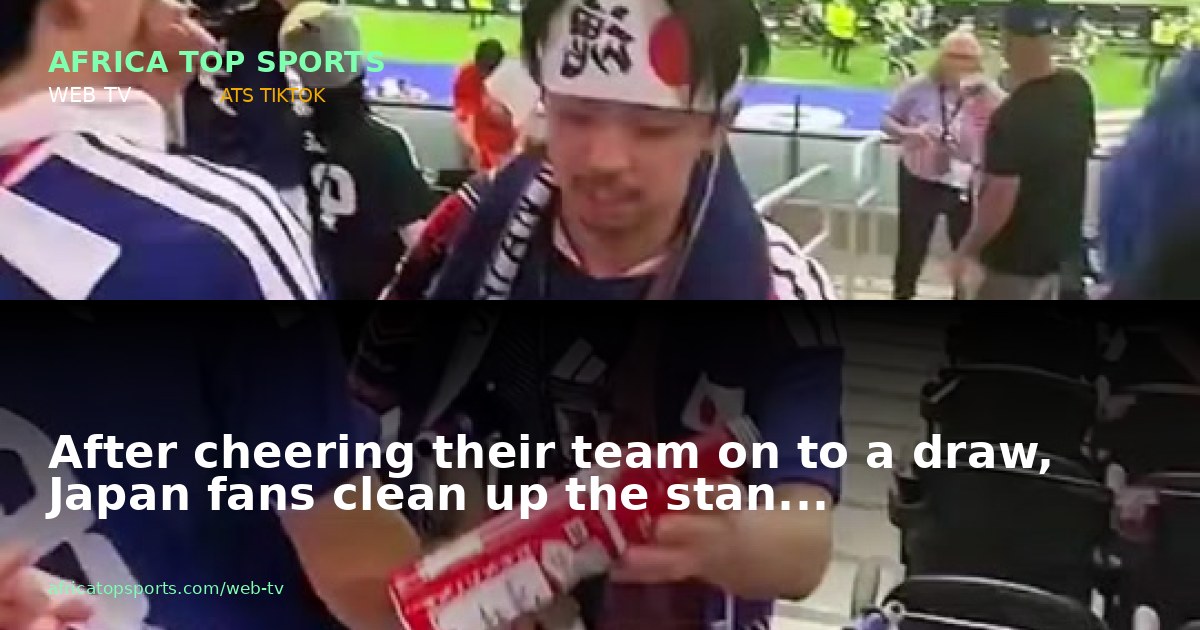 After cheering their team on to a draw, Japan fans clean up the stan...